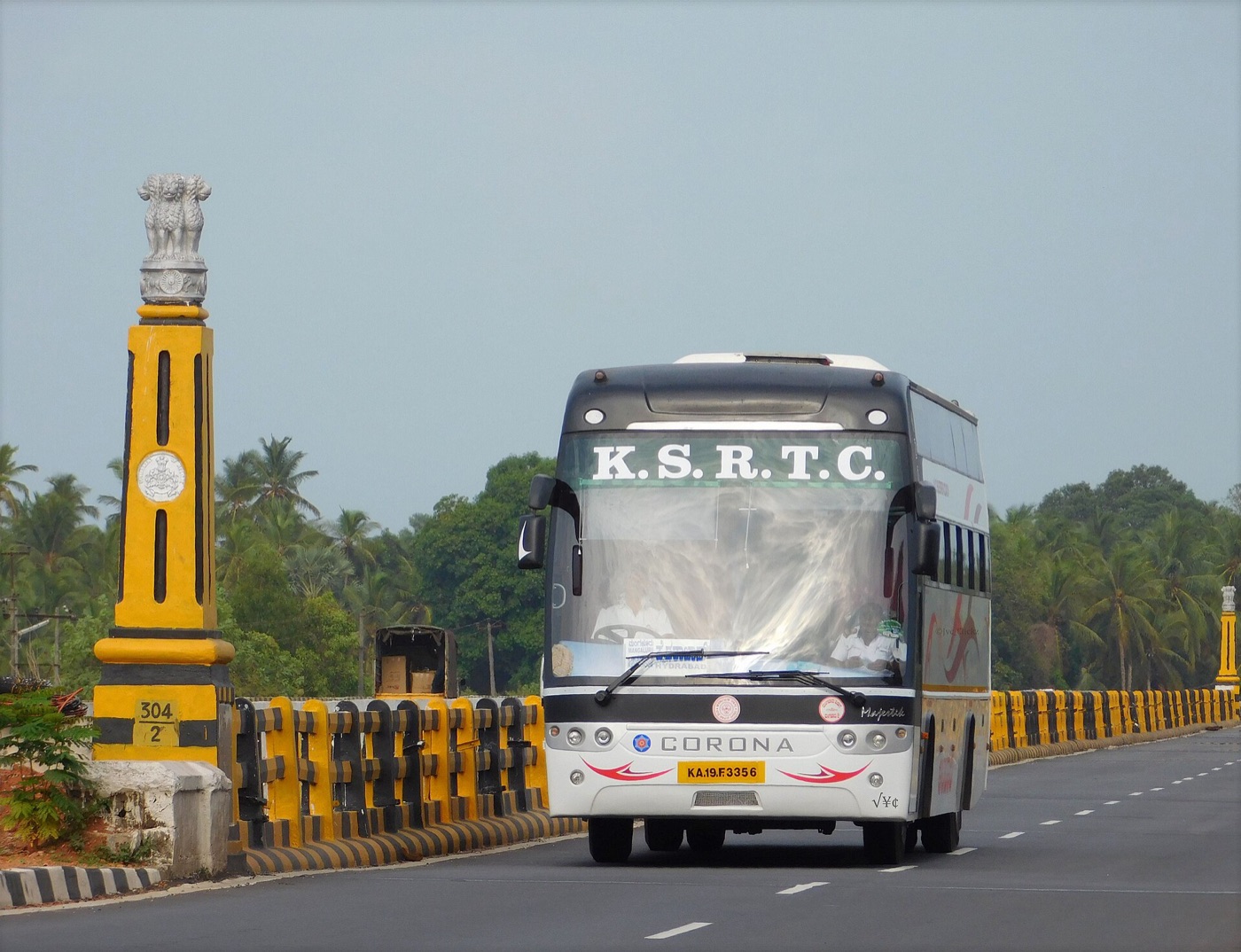 Corona AC sleeper coach on the highway